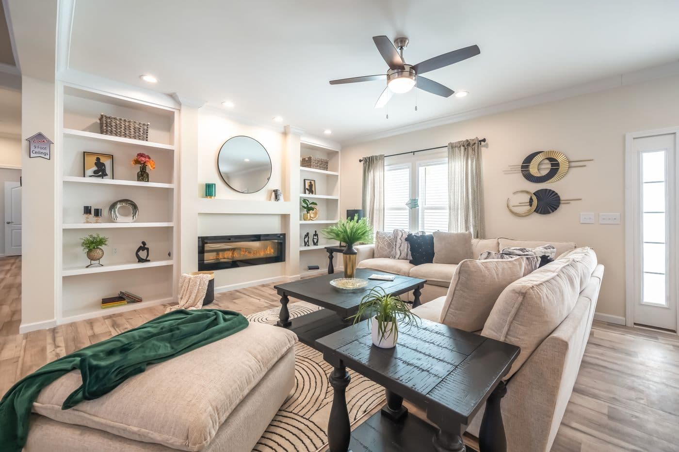 The SUPER 68 ELITE Living Room. This Manufactured Mobile Home features 3 bedrooms and 2 baths.