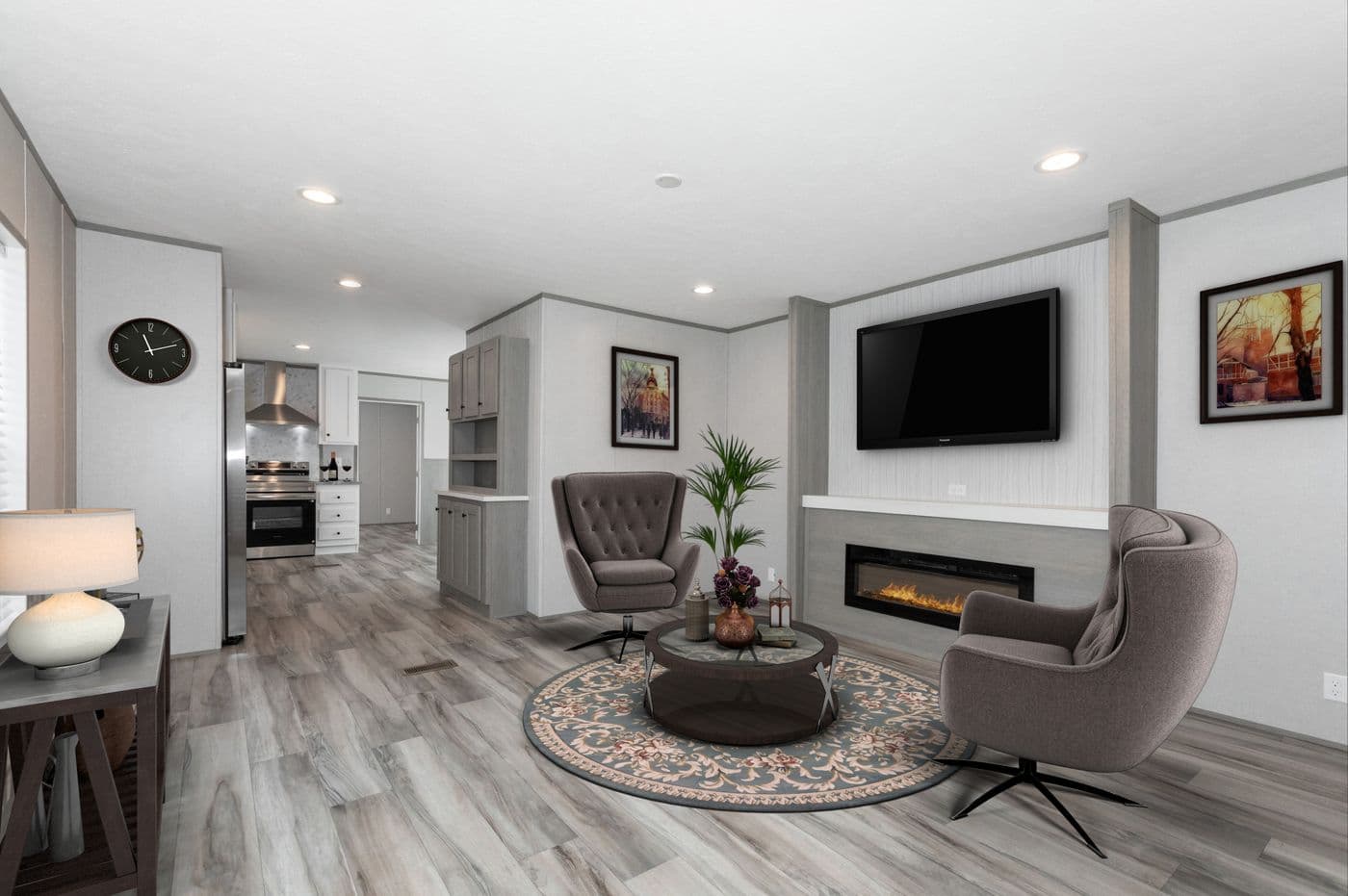 The THE ULTIMATE SHOWER Living Room. This Manufactured Mobile Home features 3 bedrooms and 2 baths.
