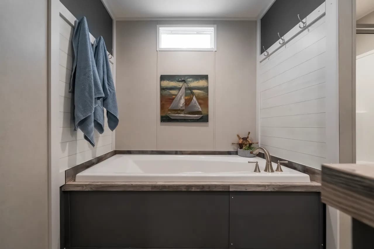 The ANNIVERSARY CHOICE Exterior. This Manufactured Mobile Home features 3 bedrooms and 2 baths.