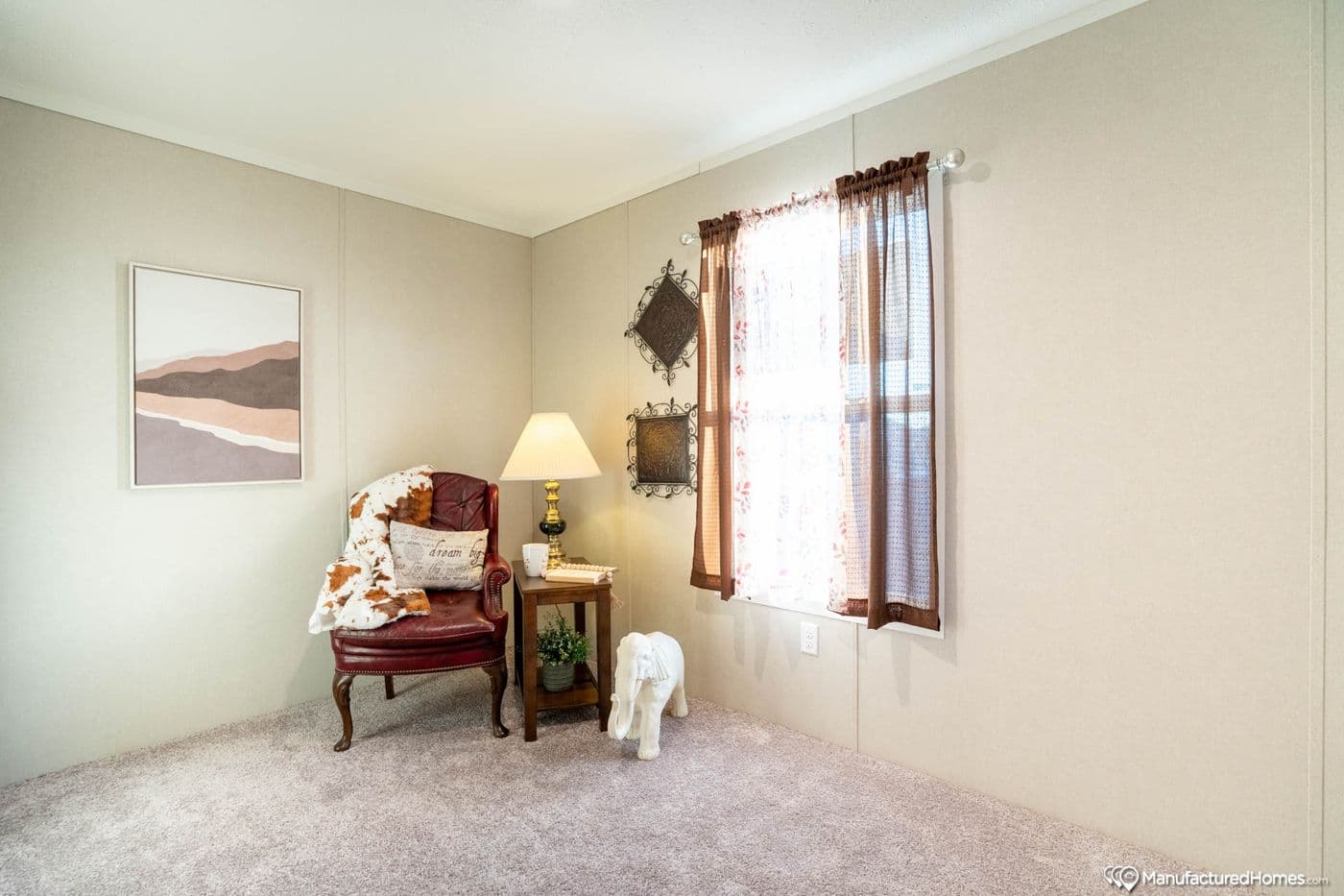 The TOPAZ 70 Guest Bedroom. This Manufactured Mobile Home features 3 bedrooms and 2 baths.
