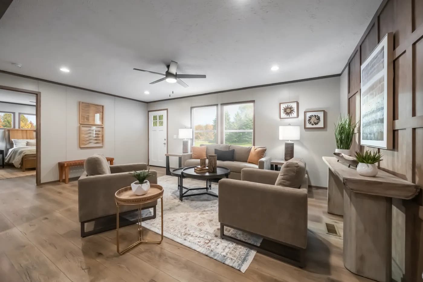 The SEVIER Living Room. This Manufactured Mobile Home features 4 bedrooms and 3 baths.