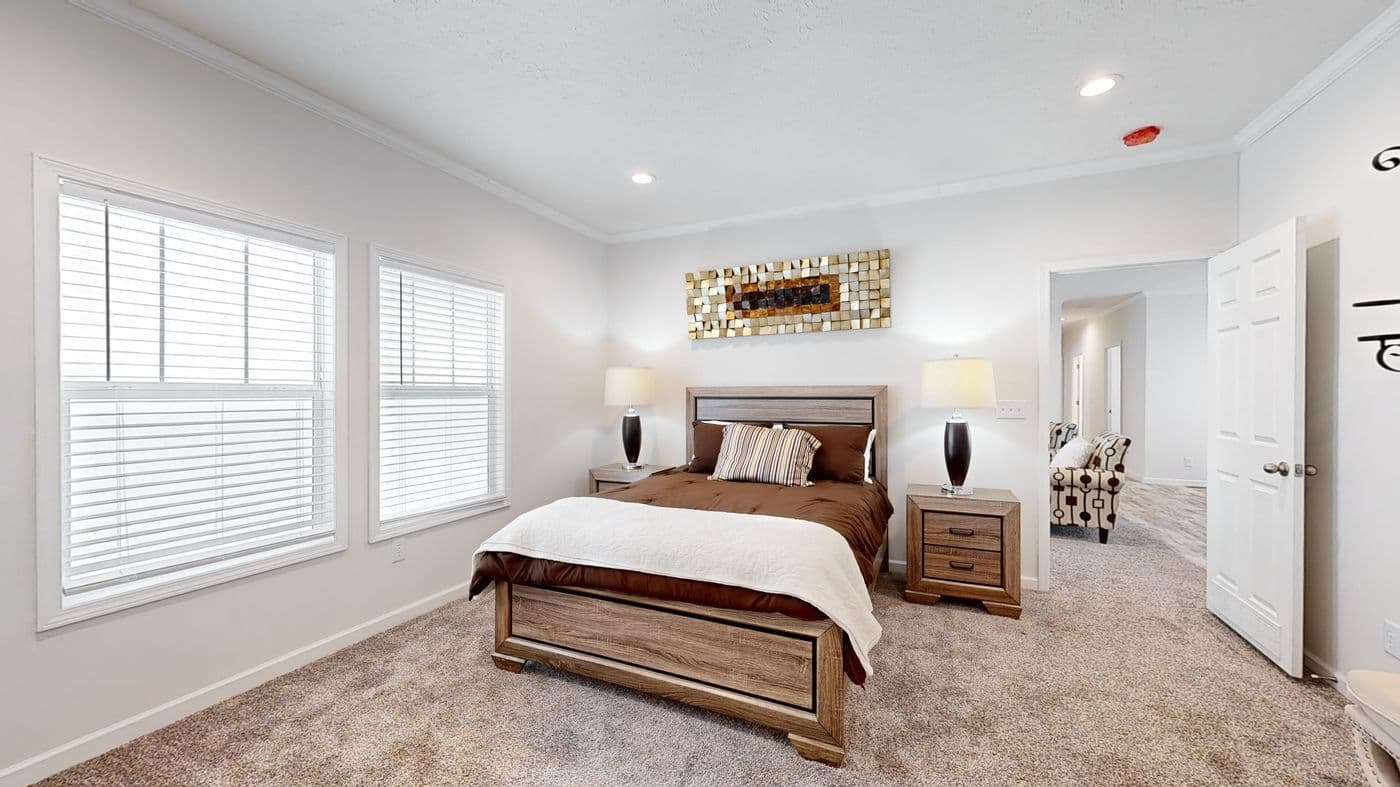 The 4872 ENTERPRISE 32X76 MODULAR Primary Bedroom. This Modular Home features 4 bedrooms and 2 baths.