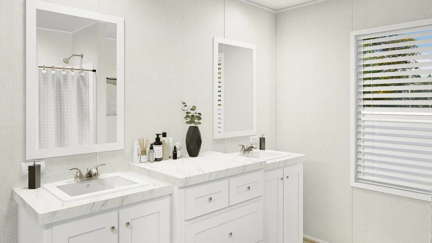 The GRAND LIVING 76 Guest Bathroom. This Manufactured Mobile Home features 4 bedrooms and 2 baths.