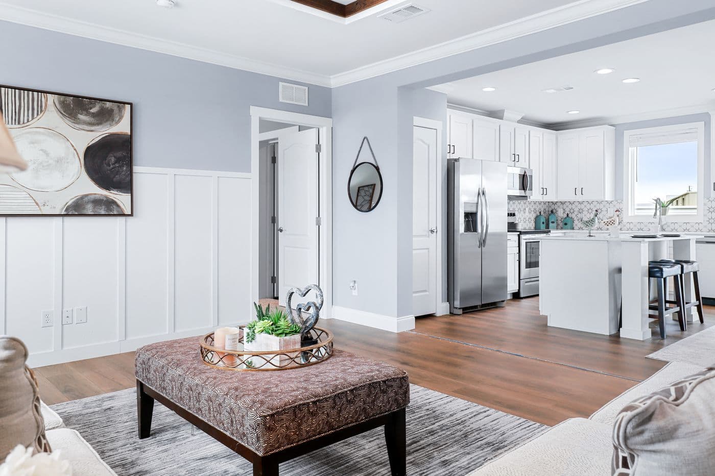 The THE ATLAS Living Room. This Manufactured Mobile Home features 4 bedrooms and 3 baths.