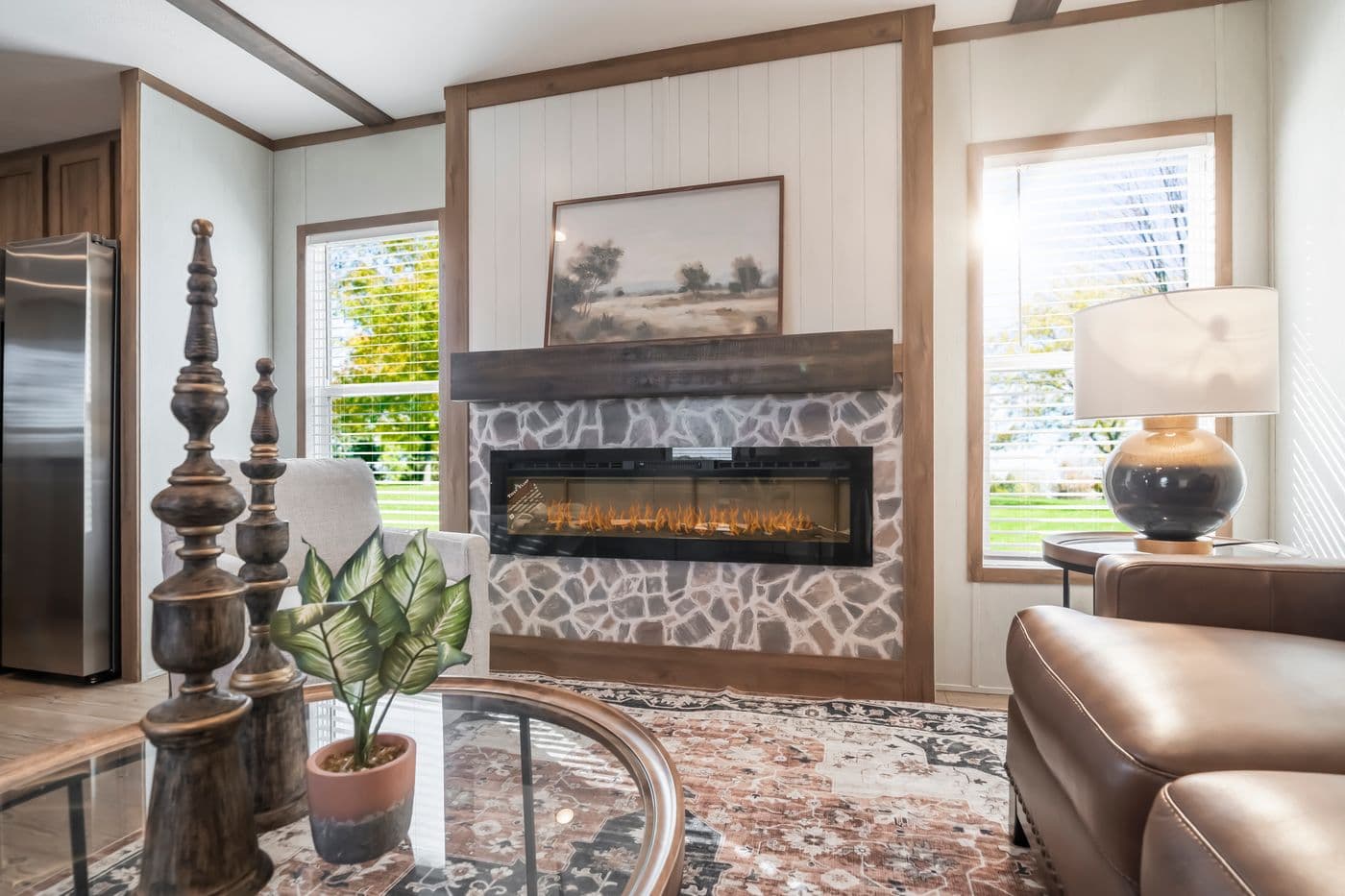 The SEAS THE DAY Living Room. This Manufactured Mobile Home features 3 bedrooms and 2 baths.