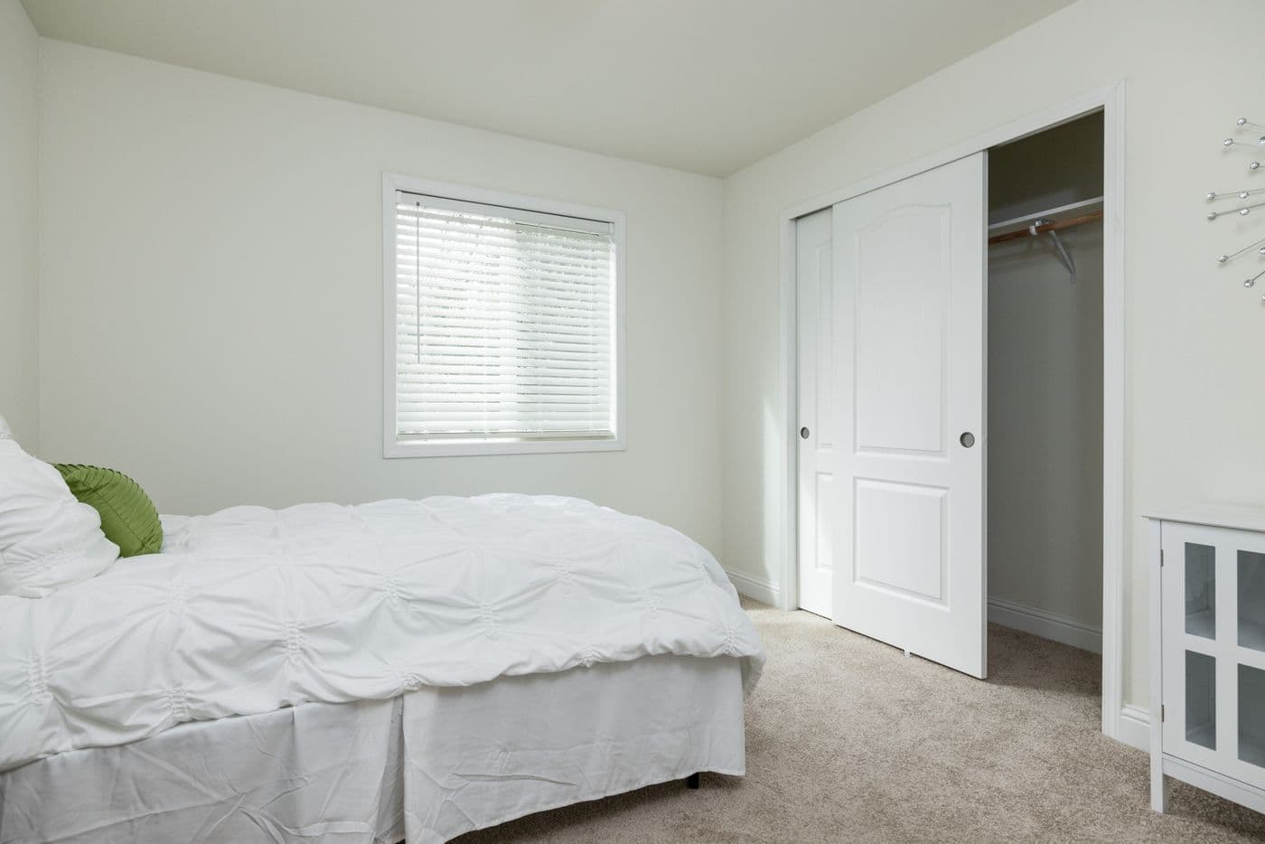 The FAIRPOINT 24403A Primary Bedroom. This Manufactured Mobile Home features 3 bedrooms and 2 baths.