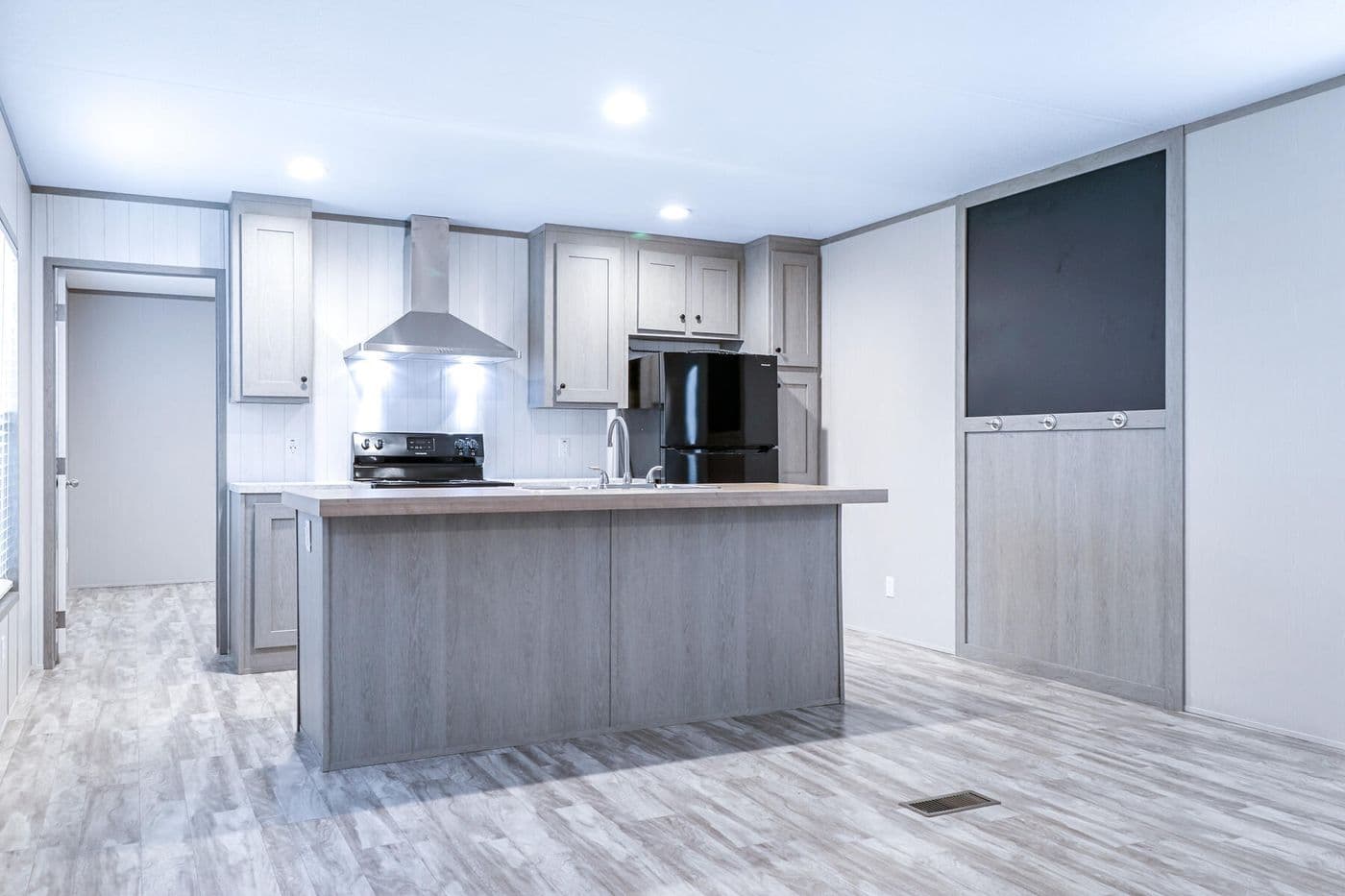 The BREEZE 16723A Exterior. This Manufactured Mobile Home features 3 bedrooms and 2 baths.
