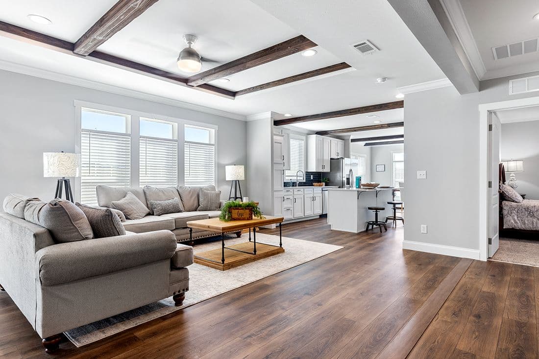 The THE VAIL Living Room. This Manufactured Mobile Home features 3 bedrooms and 2 baths.