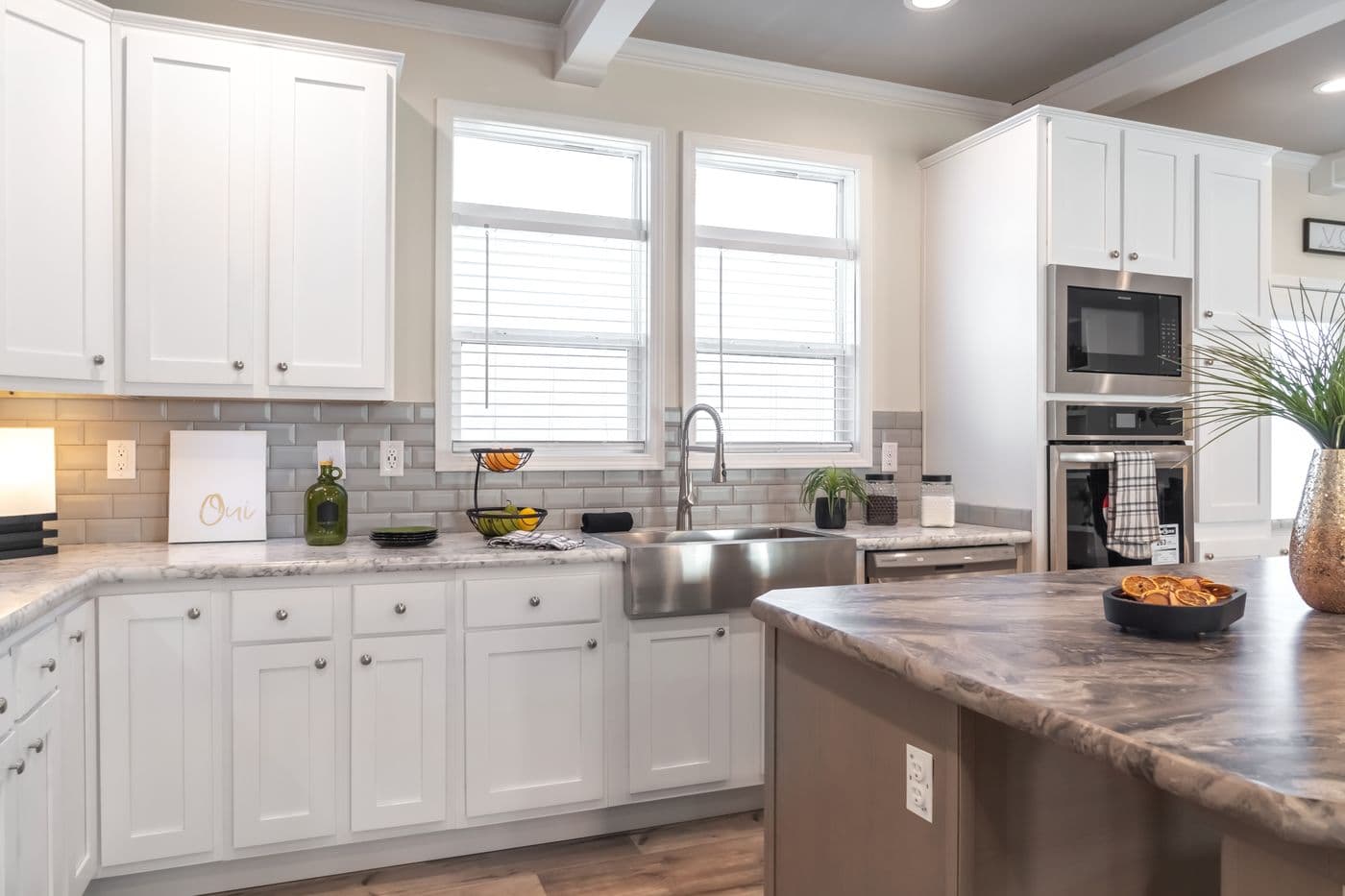 The SUPER 68 ELITE Kitchen. This Manufactured Mobile Home features 3 bedrooms and 2 baths.