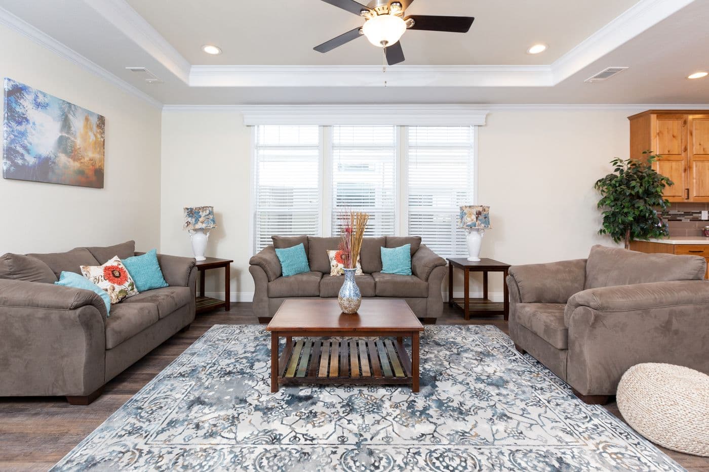 The SUM3076A Living Room. This Manufactured Mobile Home features 4 bedrooms and 2.5 baths.