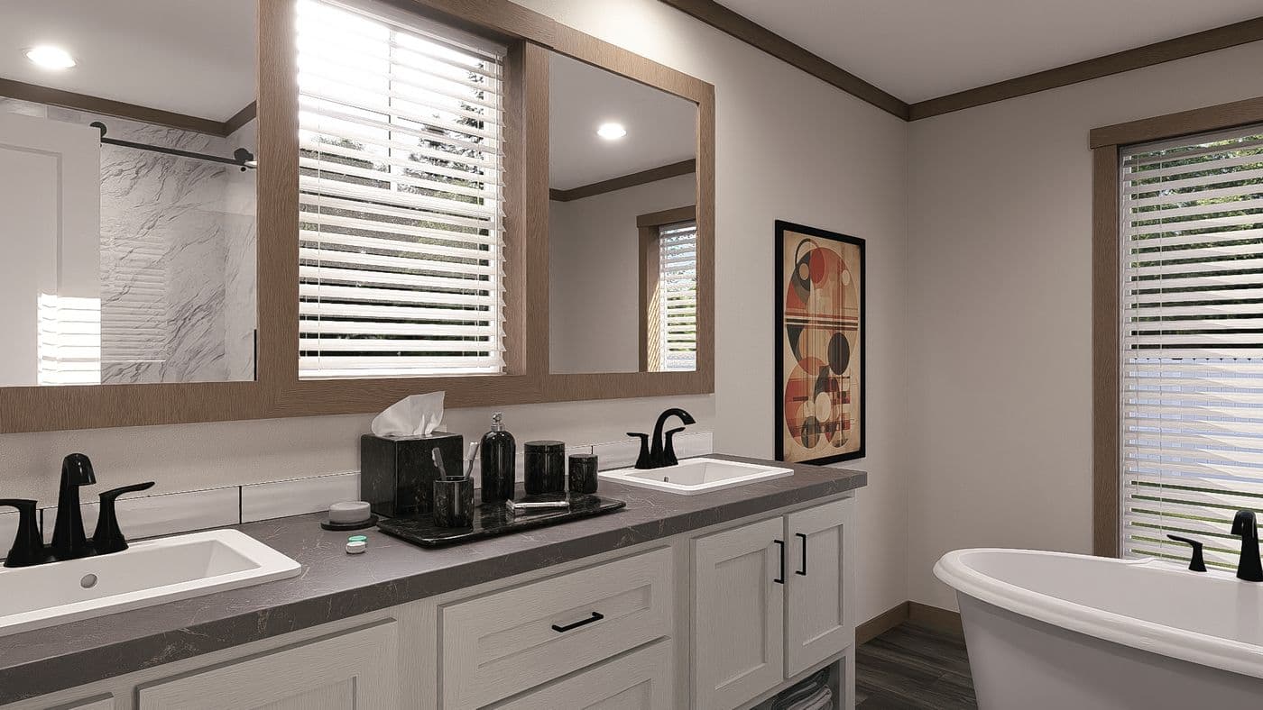 The THE EVERETT Primary Bathroom. This Manufactured Mobile Home features 4 bedrooms and 3 baths.