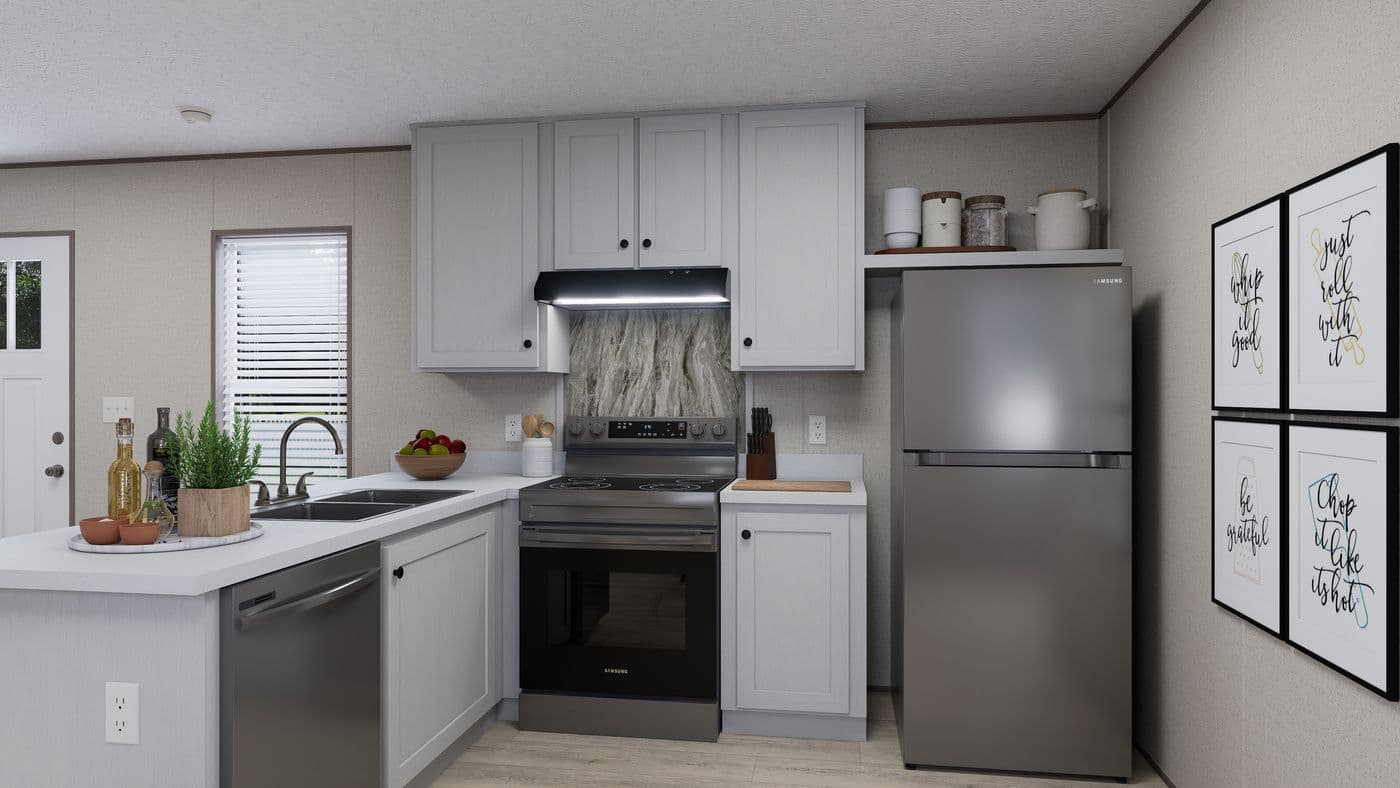 The GLACIER RIDGE Kitchen. This Manufactured Mobile Home features 2 bedrooms and 1 bath.
