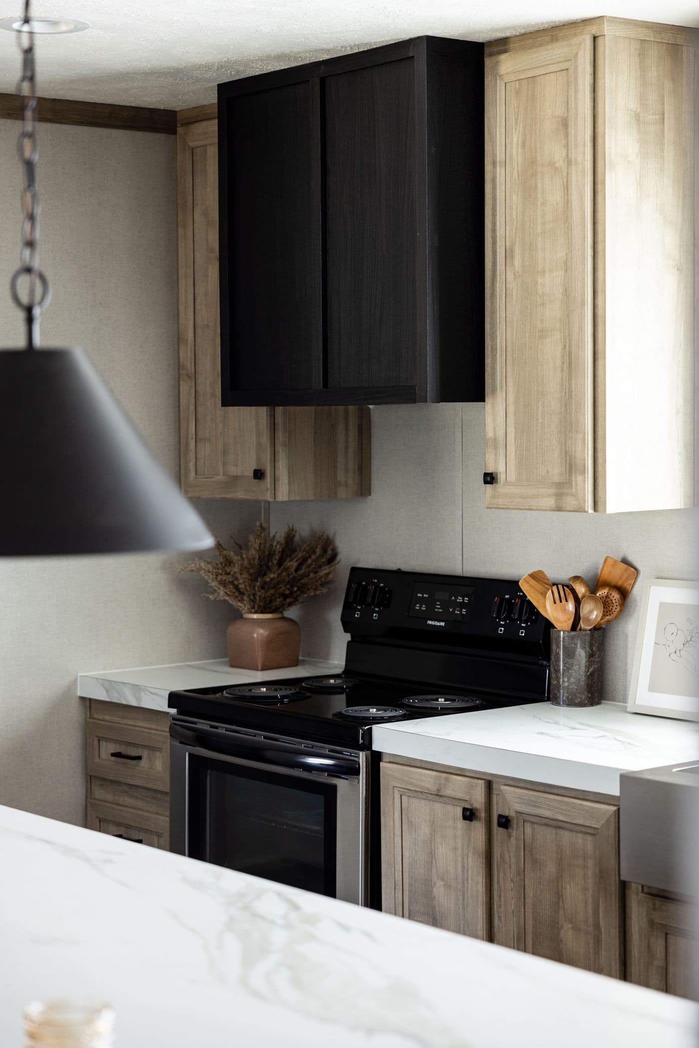 The STERLING ANNIVERSARY Kitchen. This Manufactured Mobile Home features 3 bedrooms and 2 baths.
