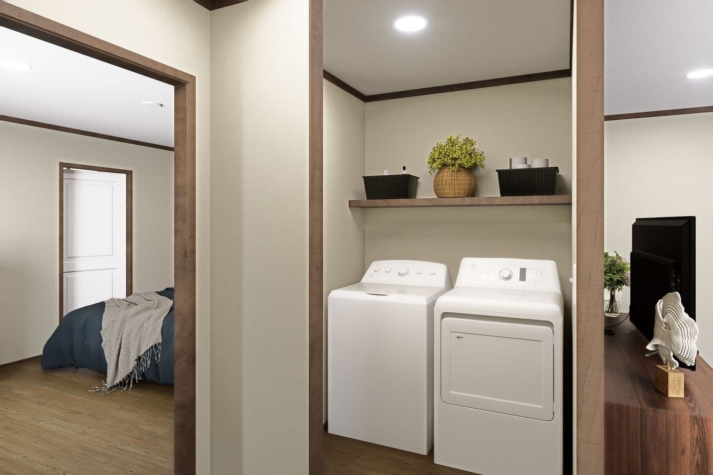 The VOYAGE Utility Room. This Manufactured Mobile Home features 3 bedrooms and 2 baths.