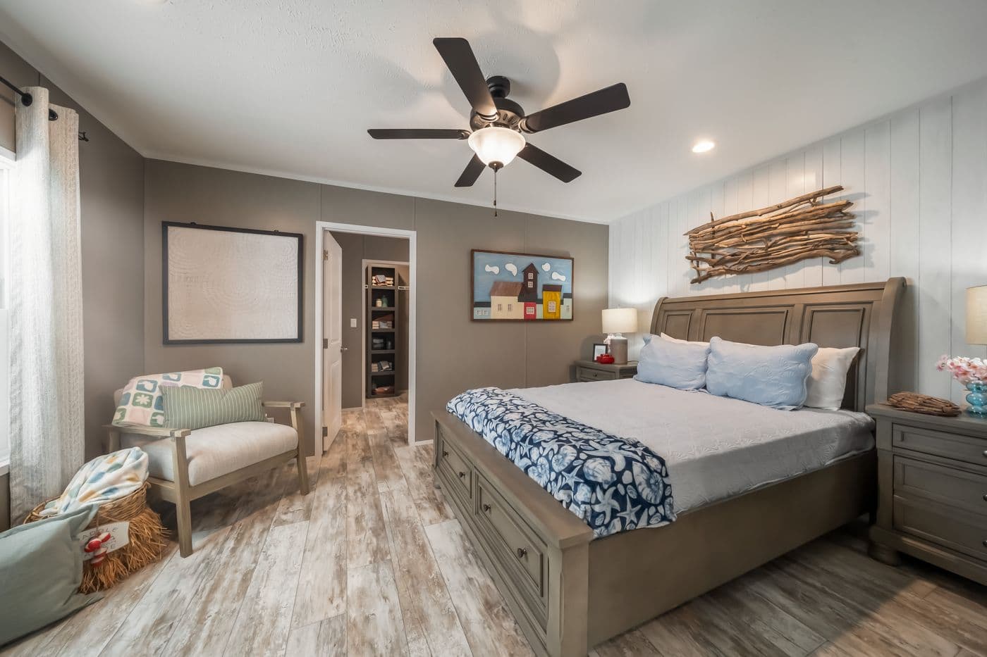 The THE DRIFTWOOD Primary Bedroom. This Manufactured Mobile Home features 3 bedrooms and 2 baths.