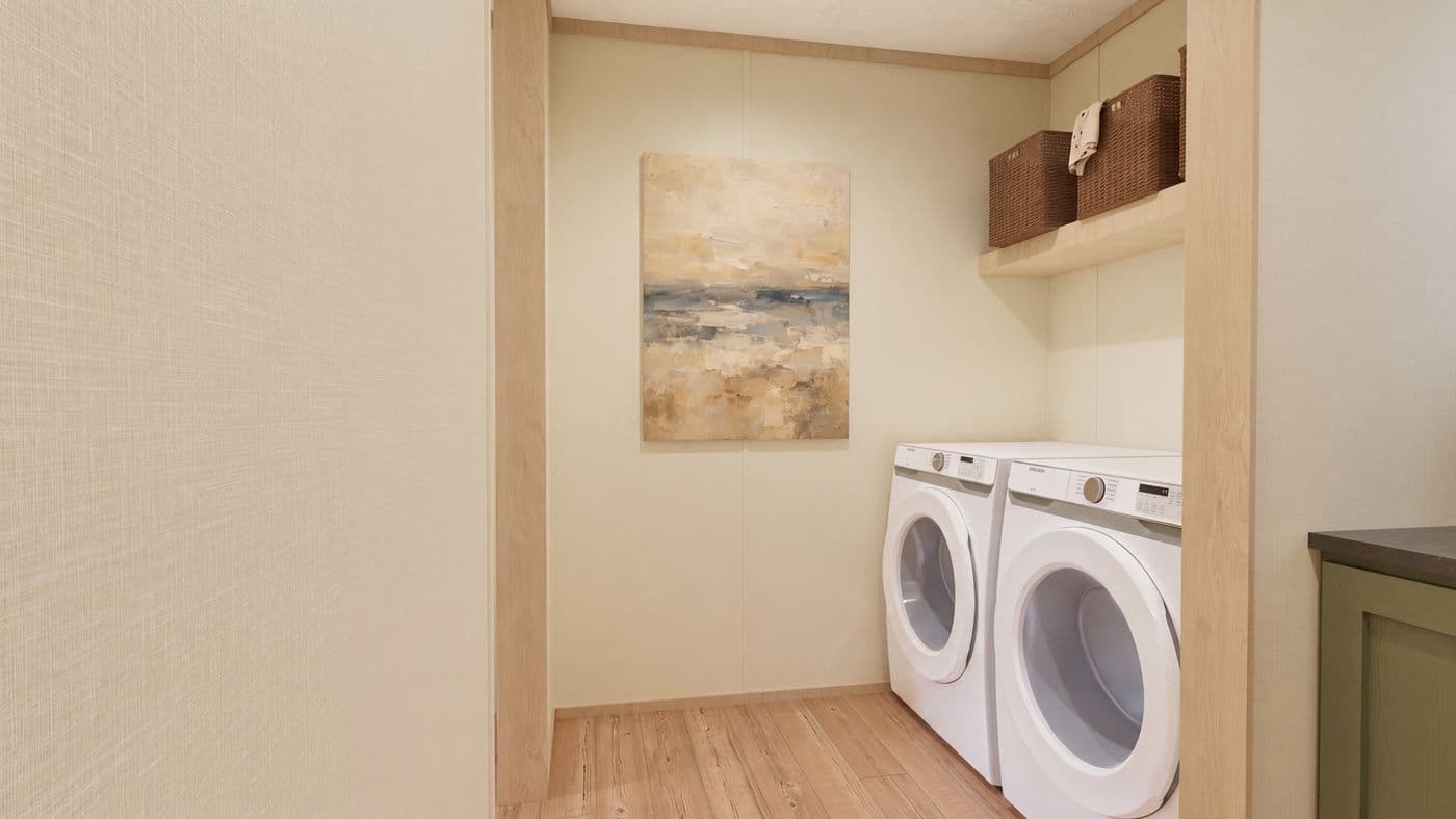 The BOONE Utility Room. This Manufactured Mobile Home features 4 bedrooms and 2 baths.