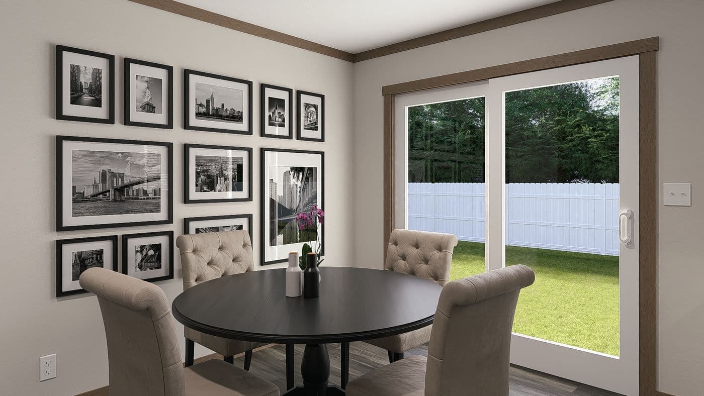 The LIZZIE Dining Area. This Manufactured Mobile Home features 3 bedrooms and 2 baths.