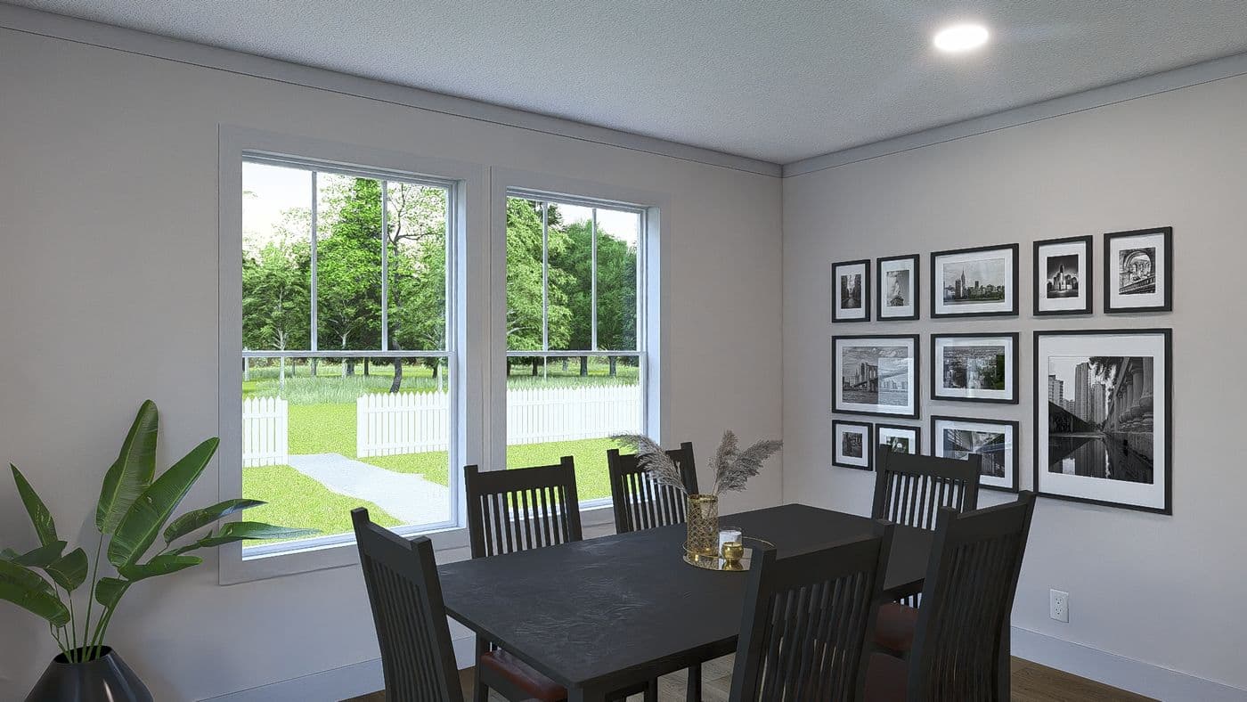 The JOHNNY B GOODE Dining Room. This Manufactured Mobile Home features 3 bedrooms and 2 baths.