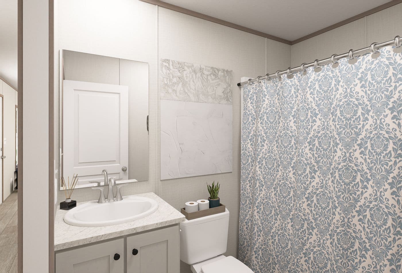 The FLEX ANNIVERSARY Guest Bathroom. This Manufactured Mobile Home features 3 bedrooms and 2 baths.