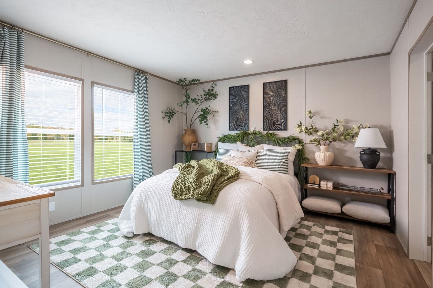The VISTA Primary Bedroom. This Manufactured Mobile Home features 3 bedrooms and 2 baths.