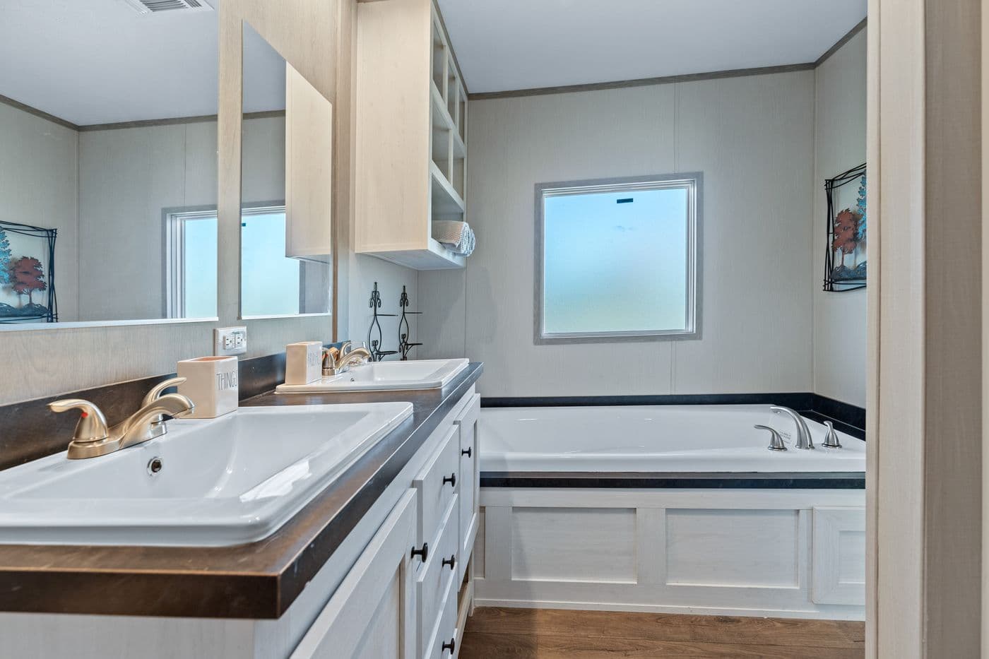 The RESOLUTION 16763J Primary Bathroom. This Manufactured Mobile Home features 3 bedrooms and 2 baths.