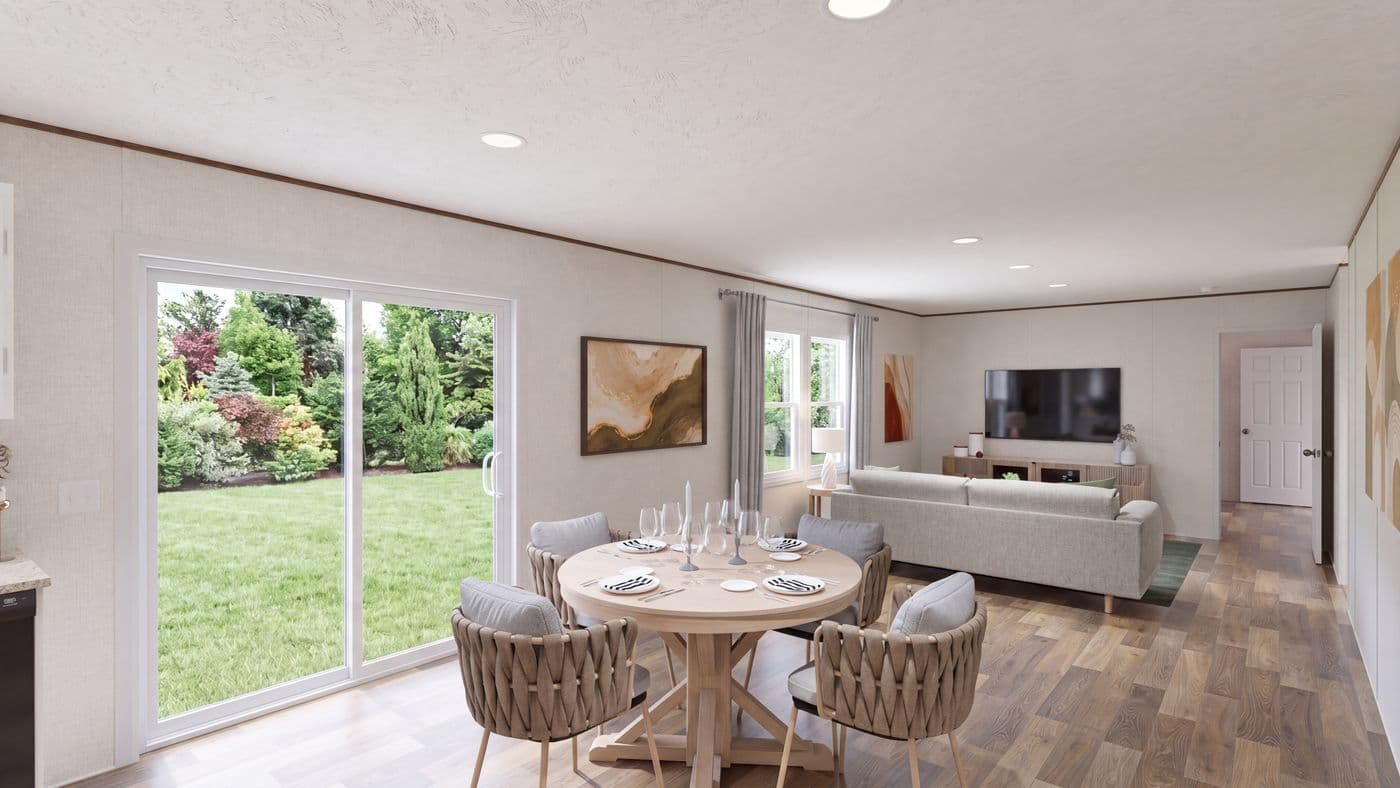 The SYCAMORE Dining Area. This Manufactured Mobile Home features 4 bedrooms and 2 baths.