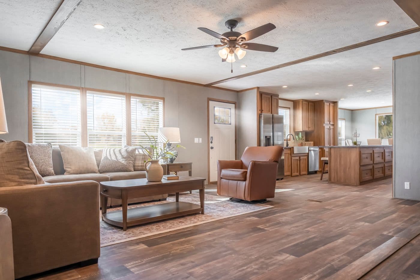 The BLACK DIAMOND Living Room. This Manufactured Mobile Home features 3 bedrooms and 2 baths.