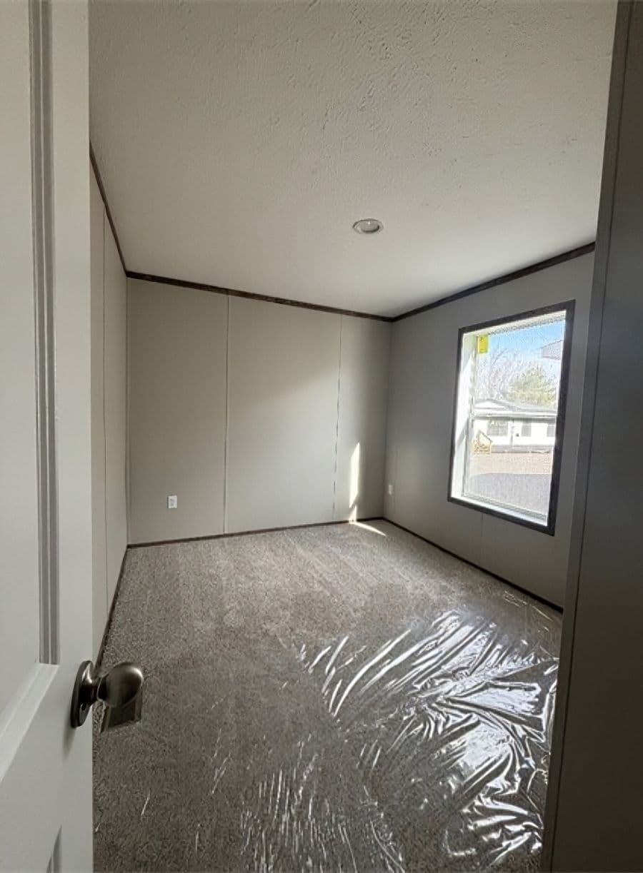 The APATITE 44 Bedroom. This Manufactured Mobile Home features 3 bedrooms and 2 baths.