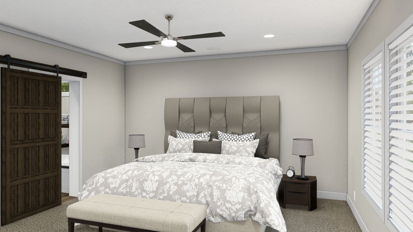 The THE DENALI Primary Bedroom. This Manufactured Mobile Home features 3 bedrooms and 2 baths.