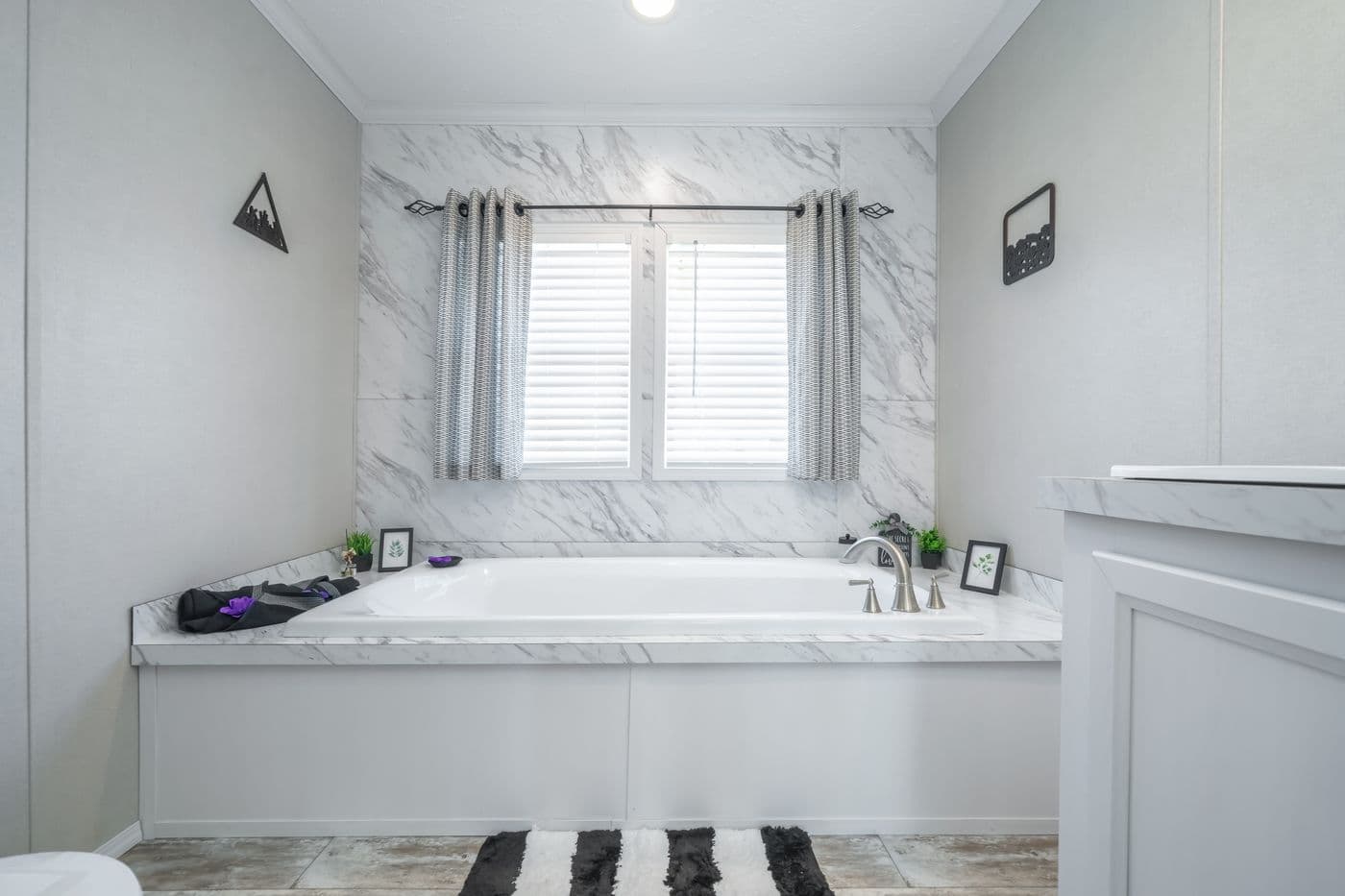The STELLA Primary Bathroom. This Manufactured Mobile Home features 3 bedrooms and 2 baths.