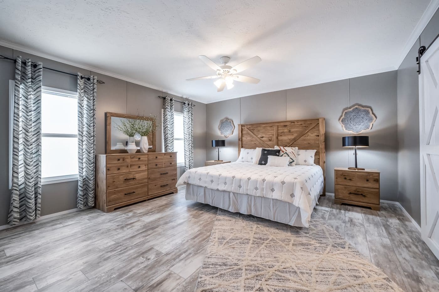 The CASCADE Primary Bedroom. This Manufactured Mobile Home features 4 bedrooms and 2 baths.