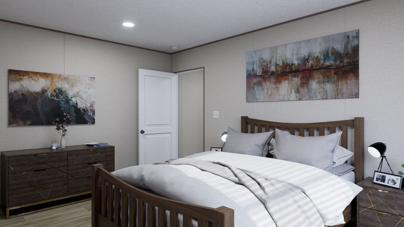 The FOOTHILLS 56 Primary Bedroom. This Manufactured Mobile Home features 2 bedrooms and 2 baths.