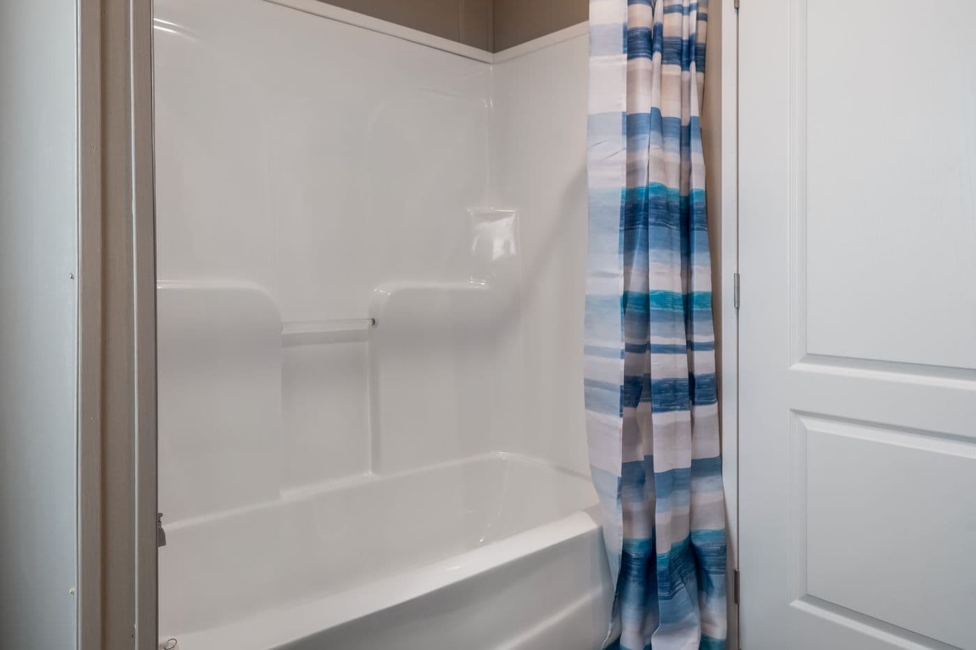 The ISLAND BREEZE 64 Guest Bathroom. This Manufactured Mobile Home features 4 bedrooms and 2 baths.