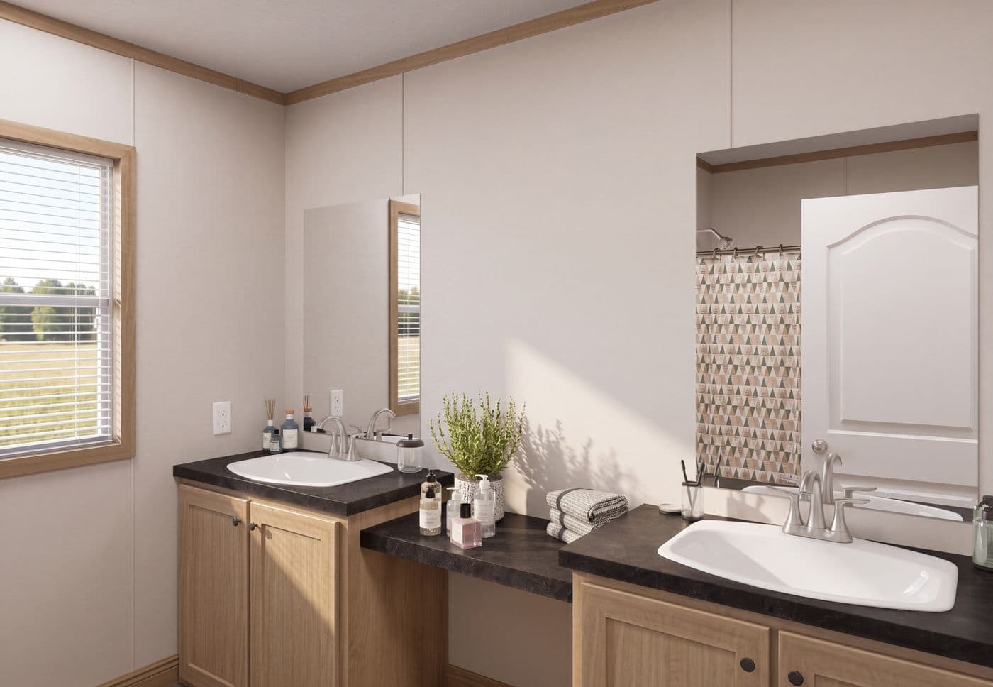 The THE MOUNTAINEER 72 Guest Bathroom. This Manufactured Mobile Home features 3 bedrooms and 2 baths.