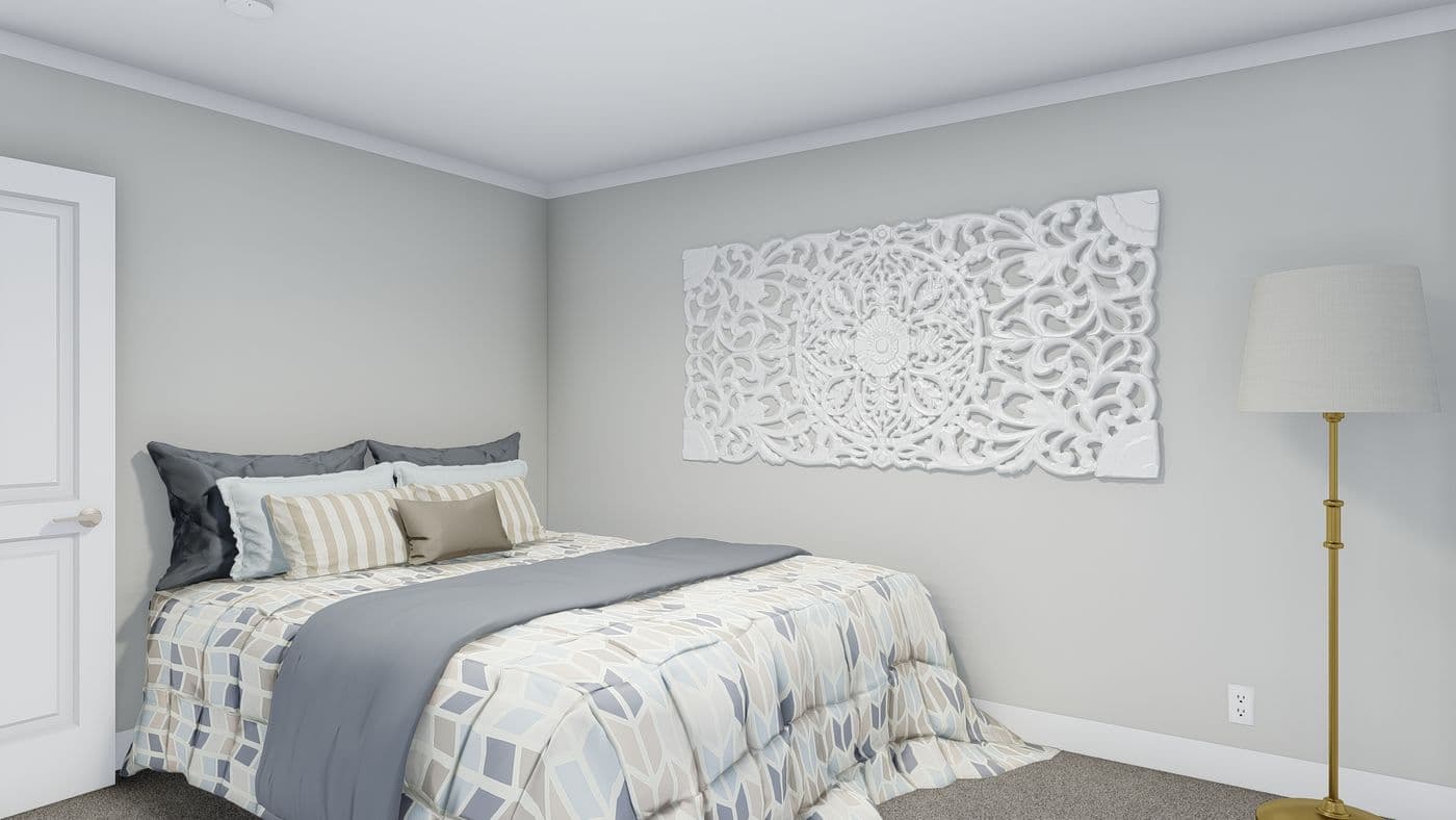 The THE BREEZE Guest Bedroom. This Manufactured Mobile Home features 3 bedrooms and 2 baths.