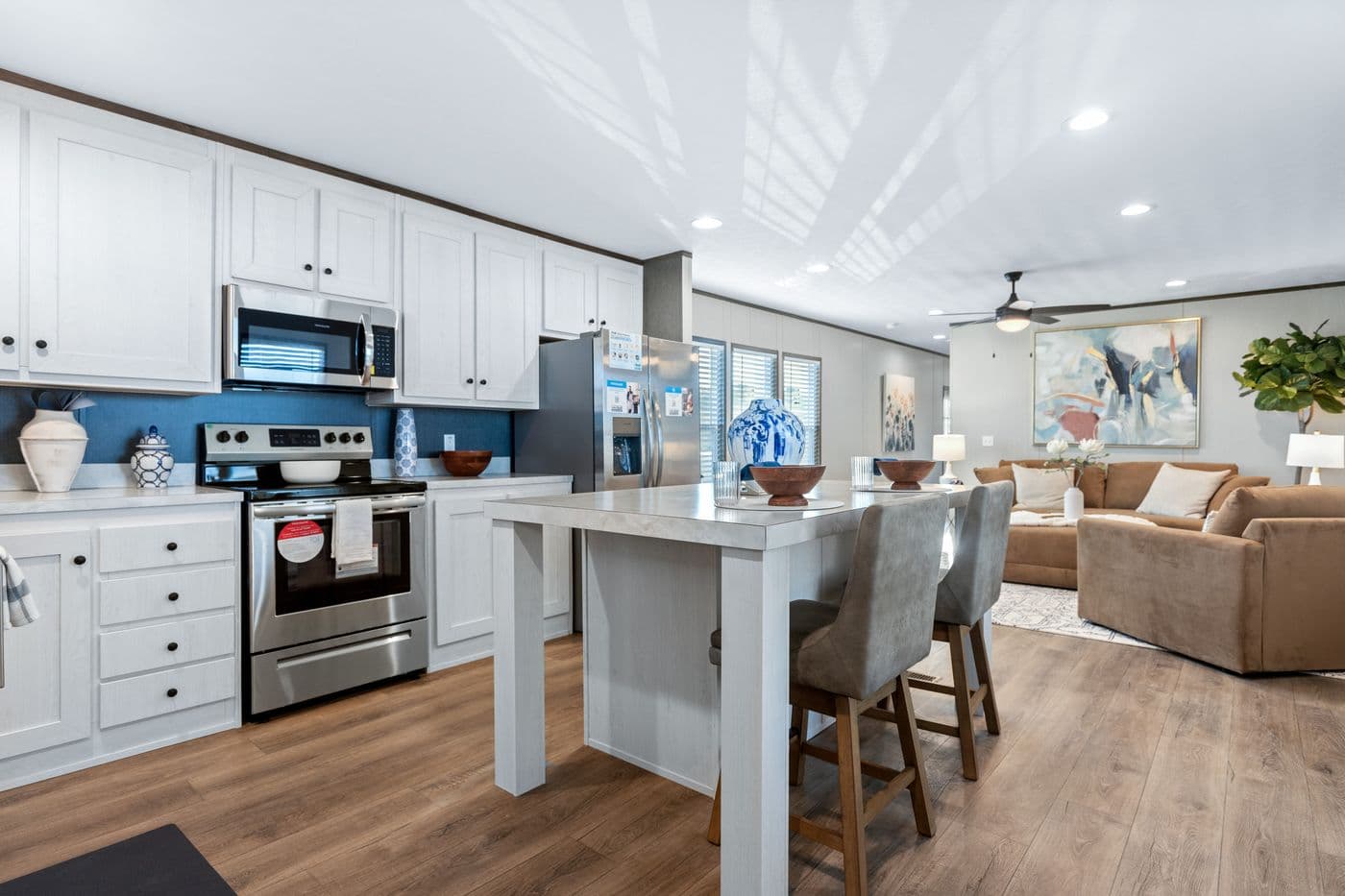 The RETREAT LIVING 16682A Kitchen. This Manufactured Mobile Home features 2 bedrooms and 2 baths.