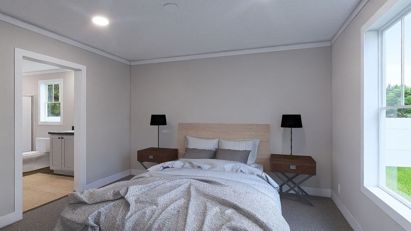 The UNDER PRESSURE Primary Bedroom. This Manufactured Mobile Home features 3 bedrooms and 2 baths.