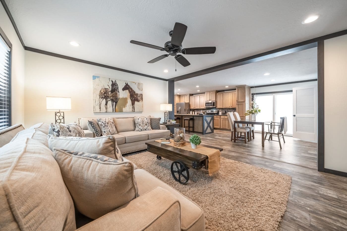 The BOUJEE 2 Living Room. This Manufactured Mobile Home features 3 bedrooms and 2 baths.