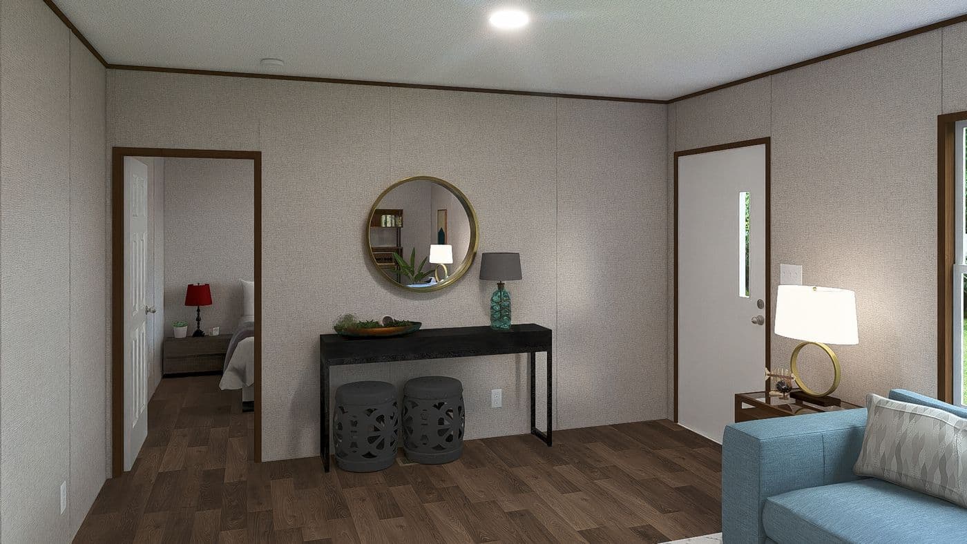 The SPRUCE Foyer. This Manufactured Mobile Home features 3 bedrooms and 2 baths.