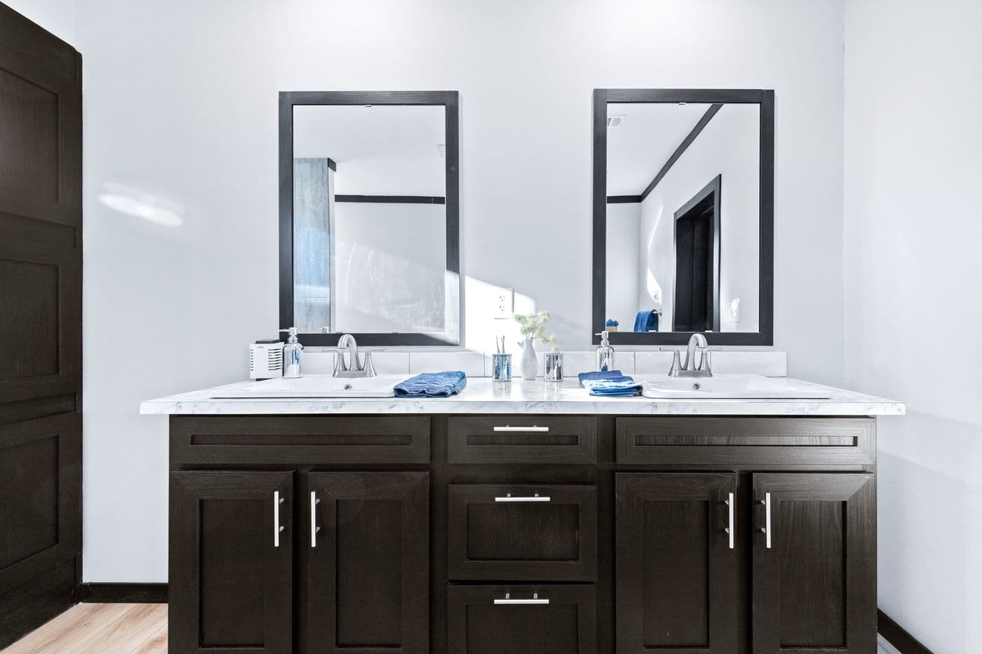 The THE LOUIS Primary Bathroom. This Manufactured Mobile Home features 4 bedrooms and 3 baths.