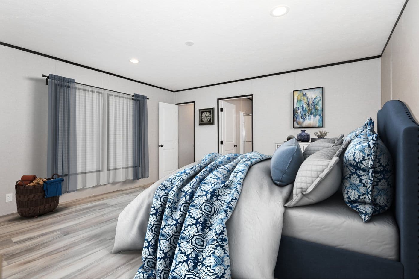 The THE FUJI Primary Bedroom. This Manufactured Mobile Home features 3 bedrooms and 2 baths.
