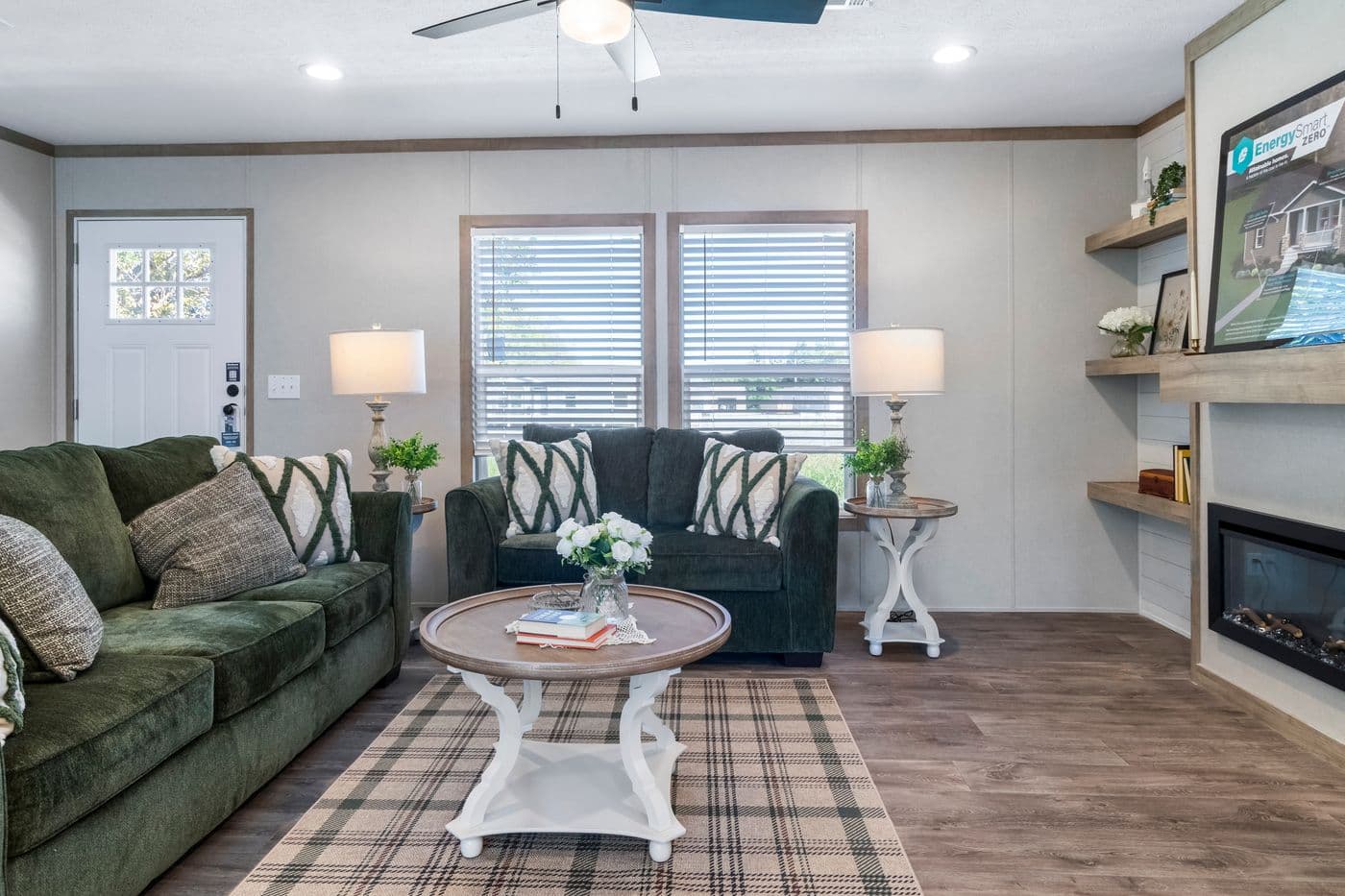 The THE BIG DEAL 52 Living Room. This Manufactured Mobile Home features 3 bedrooms and 2 baths.