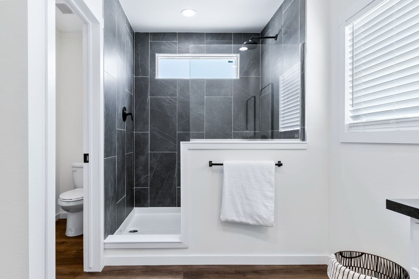 The THE IRON PEAK Primary Bathroom. This Manufactured Mobile Home features 4 bedrooms and 2 baths.