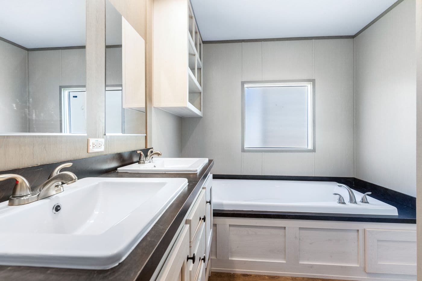 The RESOLUTION 16763K Primary Bathroom. This Manufactured Mobile Home features 3 bedrooms and 2 baths.