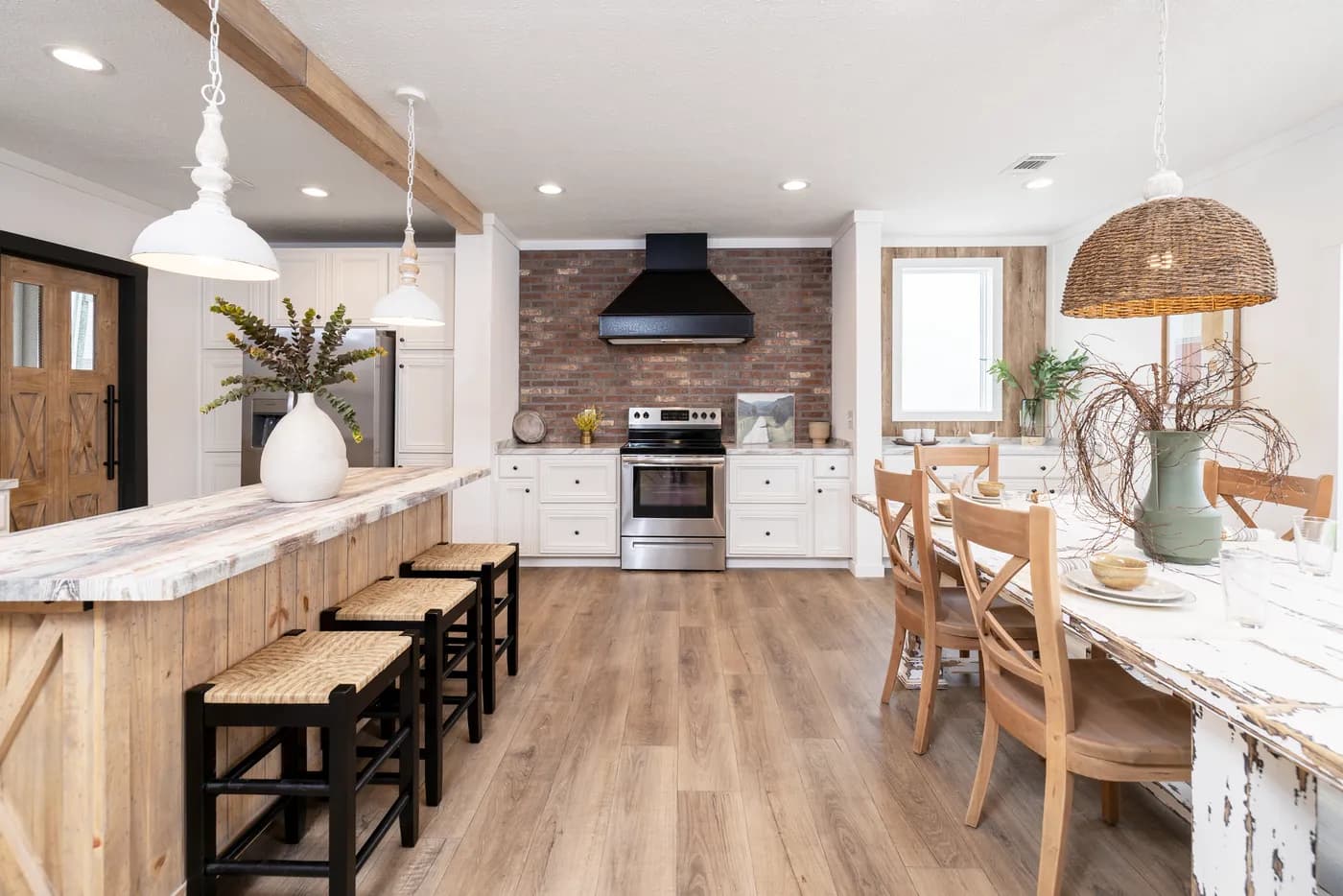 The THE ANNA FAE Dining Room. This Manufactured Mobile Home features 3 bedrooms and 2 baths.