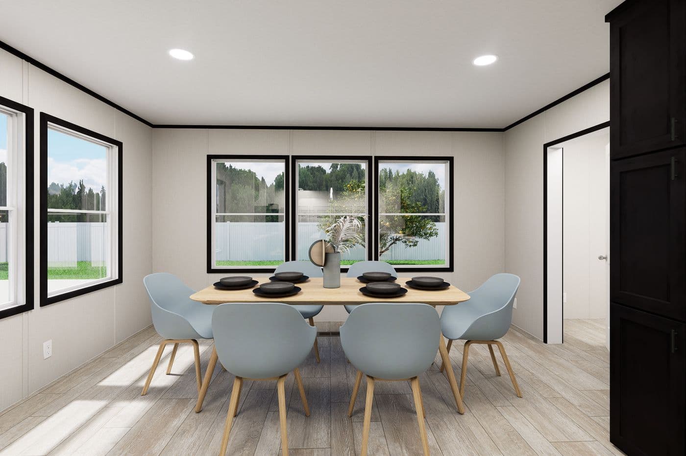 The ULTRA FLEX JEWEL GRANDE Dining Area. This Manufactured Mobile Home features 4 bedrooms and 2 baths.