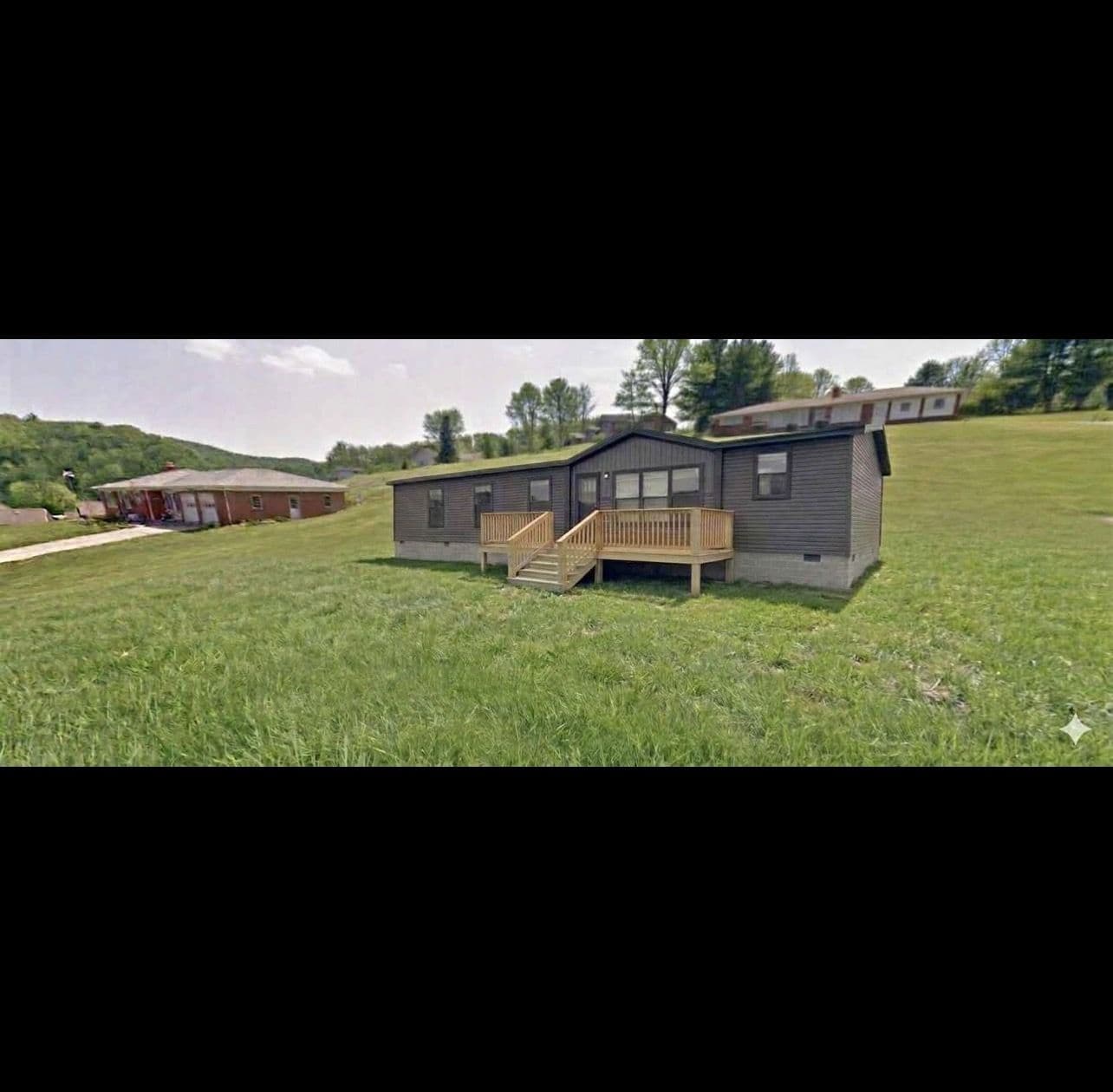 BEAUTIFUL ESTABLISHED NEIGHBORHOOD WITH PAVED ACCESS. STORAGE BUILDING ON PROPERTY. 