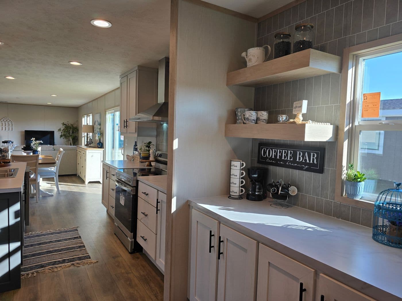 STOCK PHOTO - home for sale is same colors and does include appliances as shown but does not include furniture or decor.