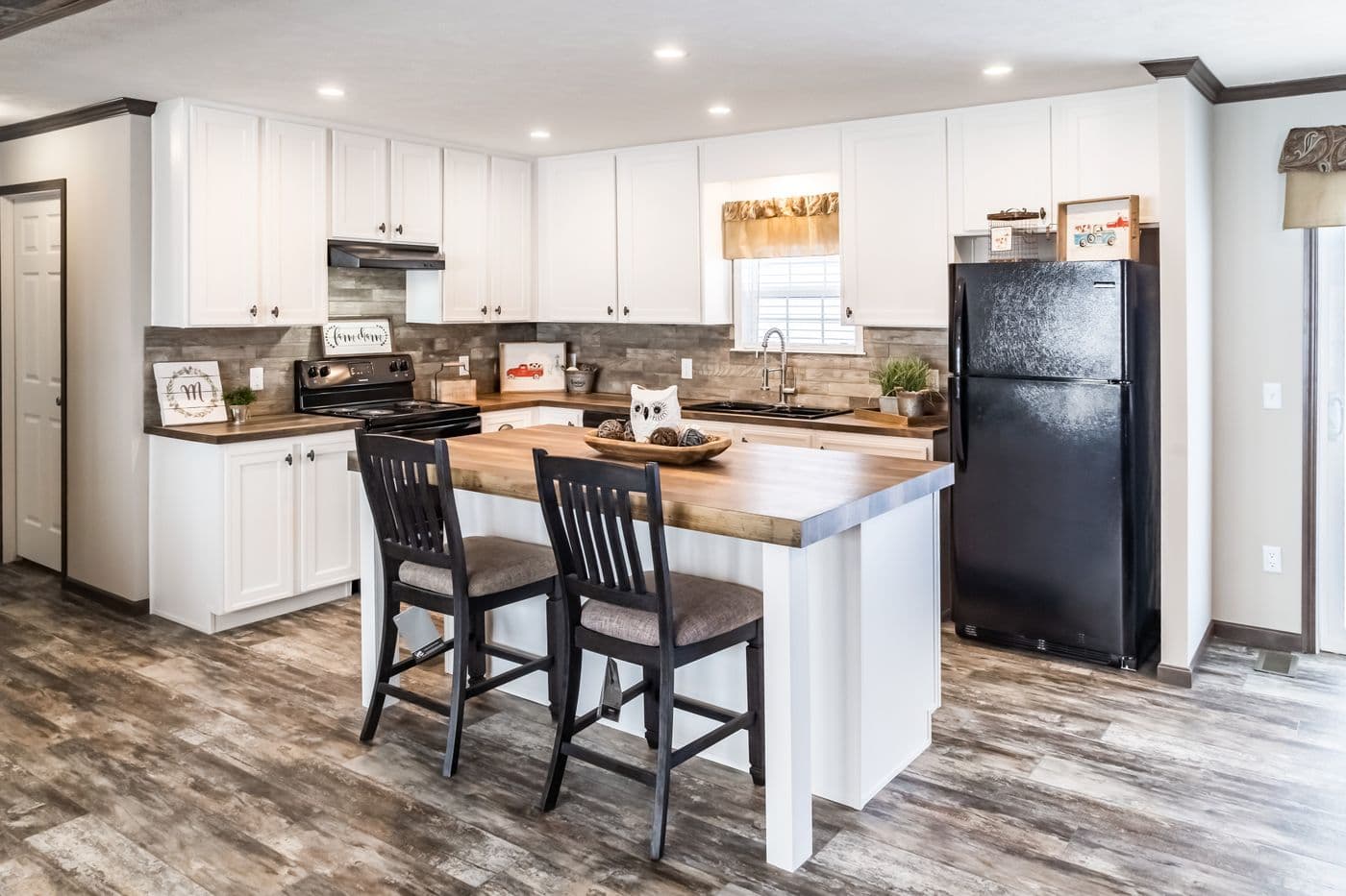 The THE STARK Kitchen. This Manufactured Mobile Home features 3 bedrooms and 2 baths.