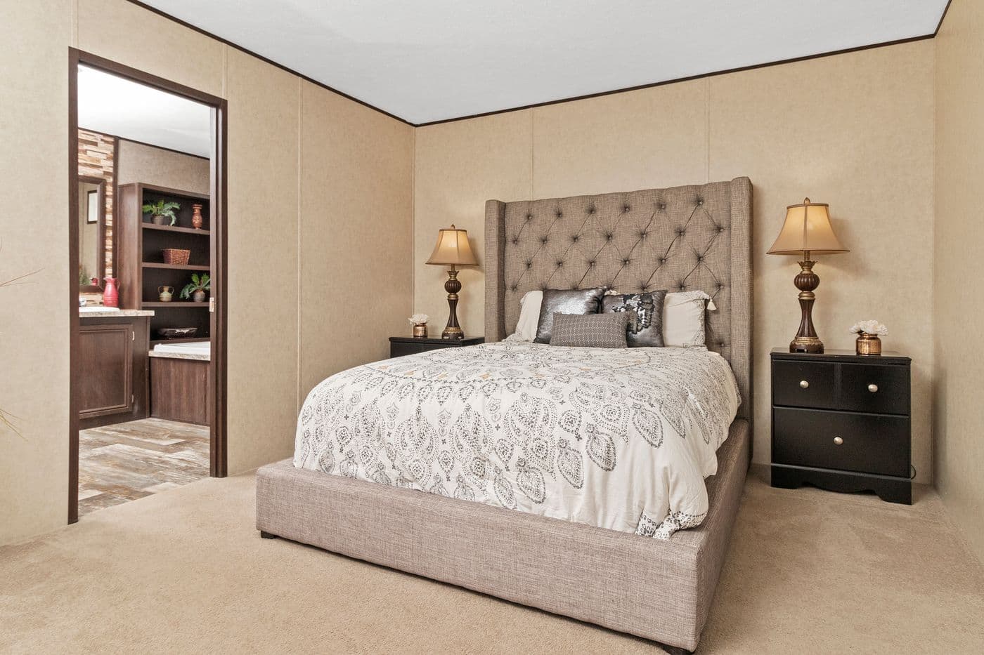 The THE PARKSIDE Primary Bedroom. This Manufactured Mobile Home features 3 bedrooms and 2 baths.